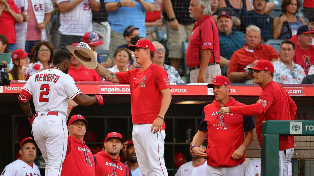 Aug 16, 2022; Anaheim, California, USA; Los Angeles Angels second baseman Luis Rengifo (2) is greeted by outfielder Mickey Moniak (16) after hitting a solo home run against the Seattle Mariners during the first inning at Angel Stadium. Mandatory Credit: Gary A. Vasquez-USA TODAY Sports  